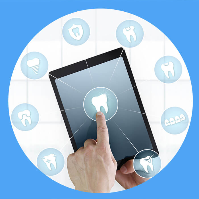 A hand interacting with a dental application on a tablet, surrounded by icons representing various dental services.