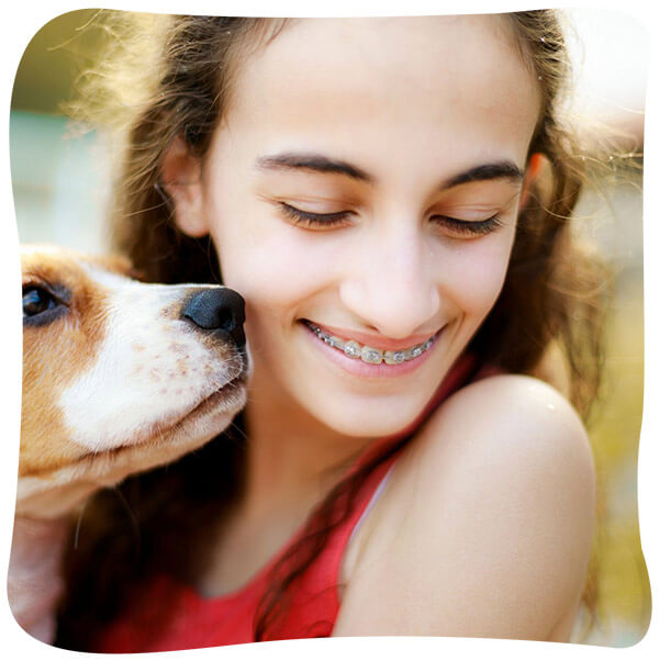 young girl with dog