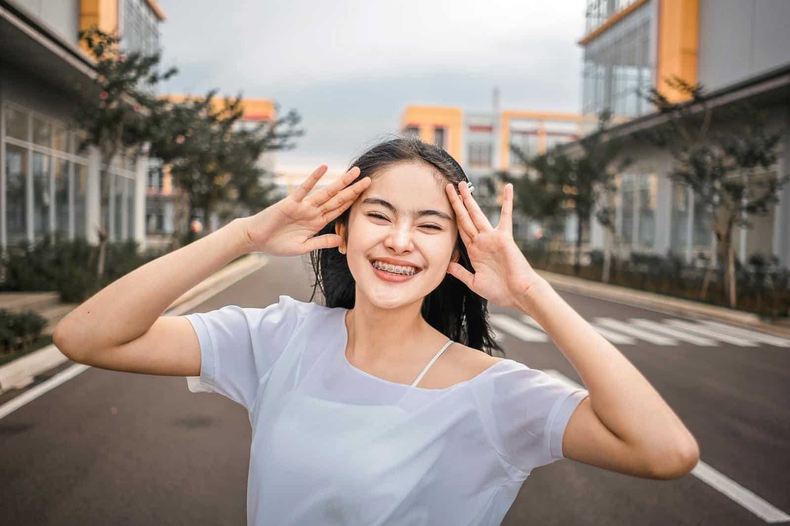 Smiling teenager with braces in Adelaide
