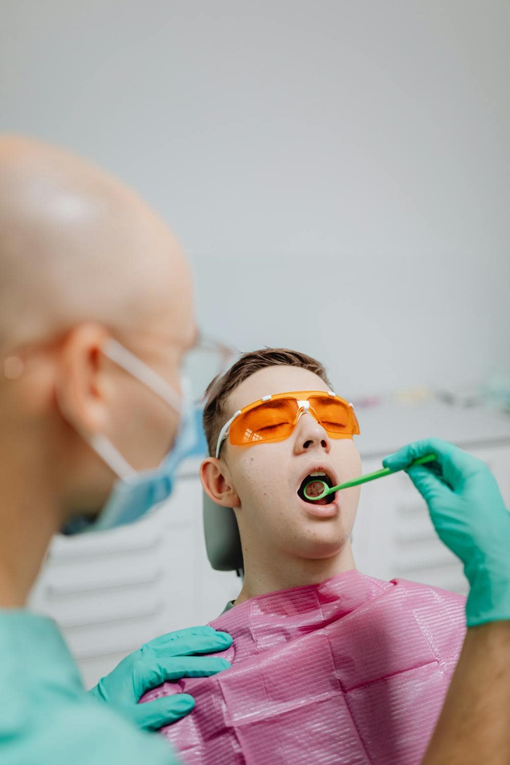 Teenager having a braces check-up at the dentist in Adelaide